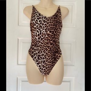 Woman’s new H and M cheetah one piece bathing suit. Medium 8